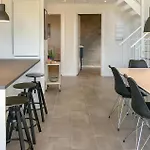 Three-bedroom In Hébergement de vacances